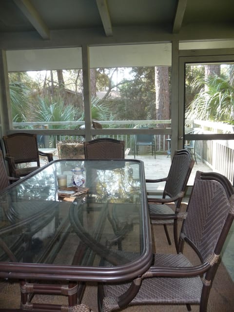 screened in porch with view to upper deck and wooded, private lot...