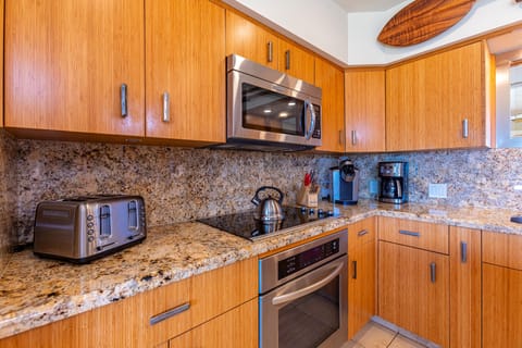New appliances, granite counters, and bamboo cabinets make cooking fun.