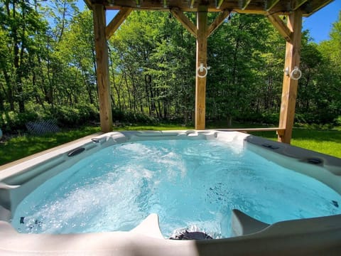 Our secluded backyard promises year-round tranquility and natural beauty.
