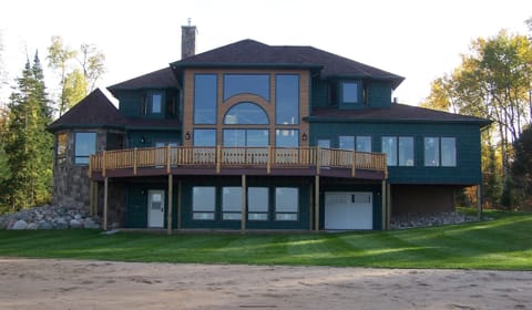 Back of the cottage, facing north.  Man-made beach.