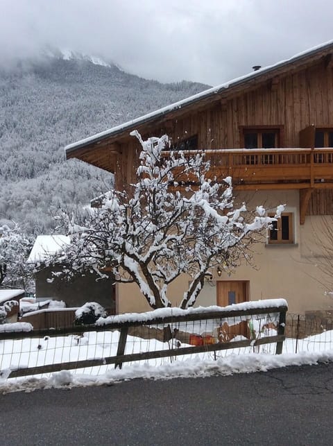 View of the outside of the apartment in the snow