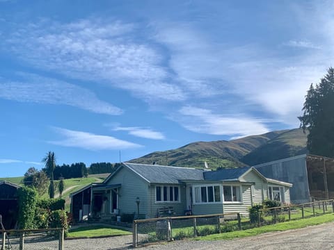 Possum Cottage with the view over our farm behind. 
