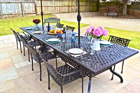 Patio in enclosed garden.
