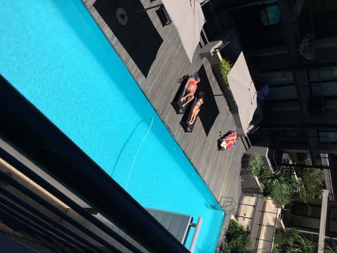 View of pool from apartment balcony 