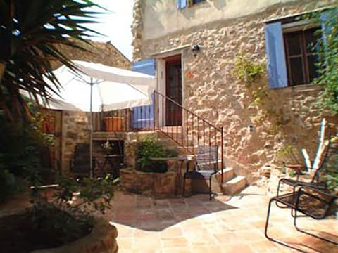 You'll pass through a sunny private courtyard before entering the house.