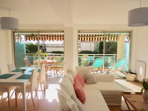 Welcome to our bright, double living/dining area that opens onto the terrace.