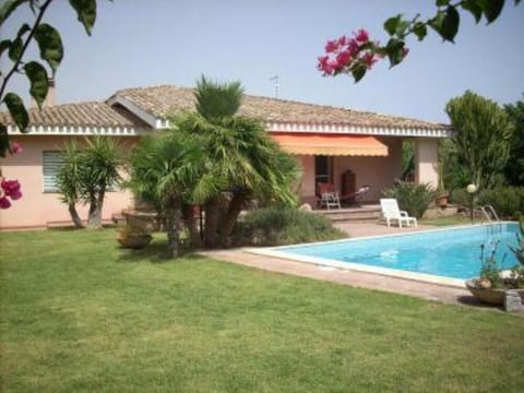 House, garden and pool