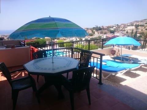 Private patio and garden with stunning views out to sea and up to the mountains.