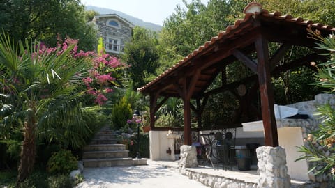 Pool area outdoor grill and outdoor shower