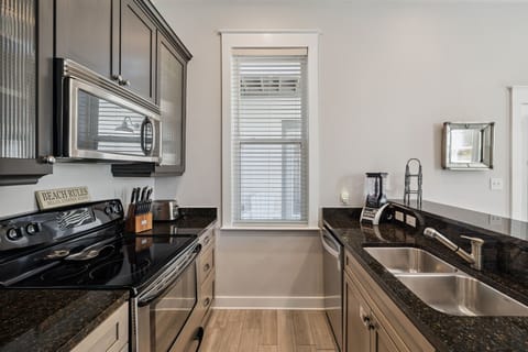 Fully Equipped Kitchen with Stainless Steel Appliances