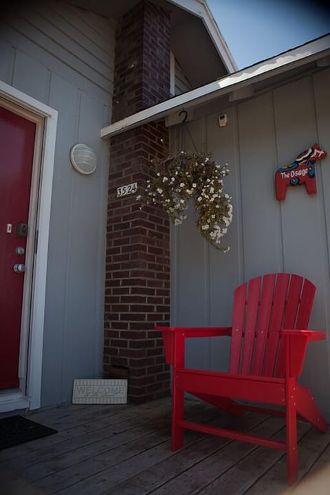The East-facing front porch/deck is the best place to read in the morning sun.