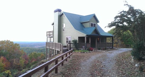 View of house coming up drive.