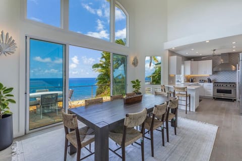 Dine with unforgettable ocean views framed by floor-to-ceiling windows.