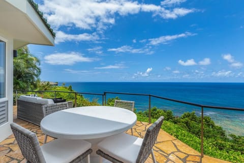 Take in sweeping ocean views from the lanai, the perfect setting for morning coffee or sunset dining.