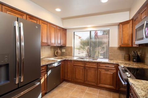 Completely remodeled with all new GE appliances, new cabinetry and granite 