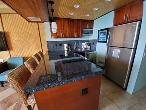 Glass top stove, nice granite island.