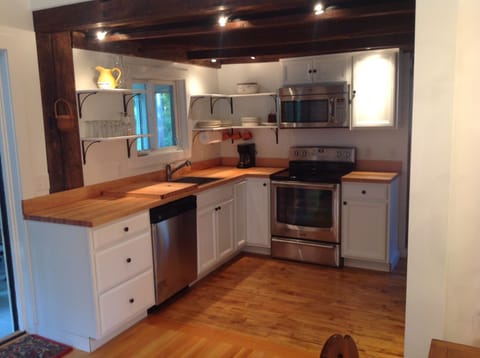 Kitchen with full size new appliances