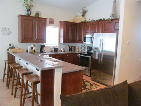 Kitchen fully furnished for your stay.