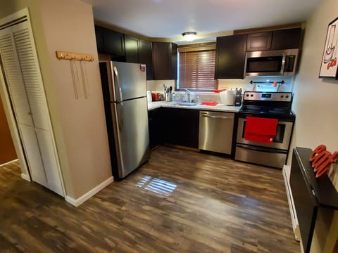 New kitchen fully equipped.  Solid Quartz Countertops and Stainless appliances