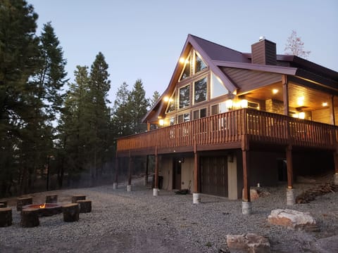 Back of cabin facing forest