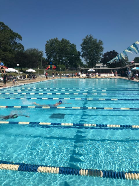 Large 25 yard pool with separate diving well. Additional baby pool. Snack bar.