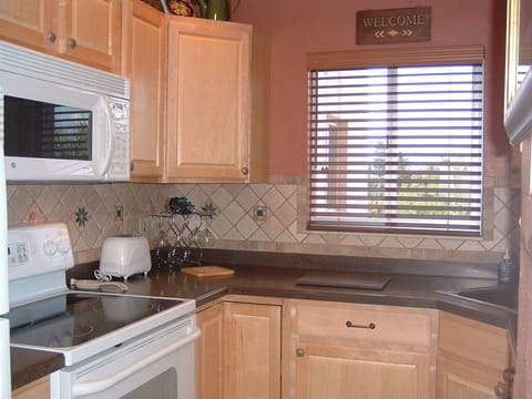 Fully equipped kitchen--microwave and glass top stove/oven, toaster, mixer, etc.