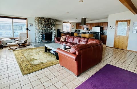 Kitchen shares great room, with ocean views. 