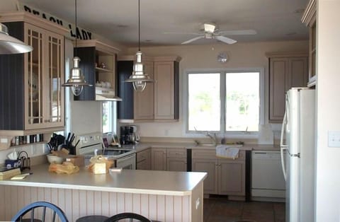 The gourmet kitchen has two refrigerators and is fully equipped for your cooking