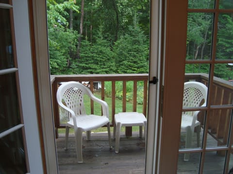 Your deck off the Great Room overlooks the beautiful backyard