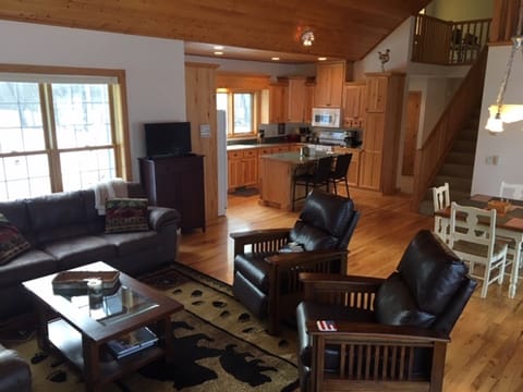 Open concept living room, dining, kitchen