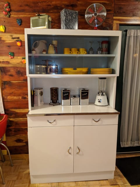 All the pots and pans you'll need in the period metal kitchen cupboard 