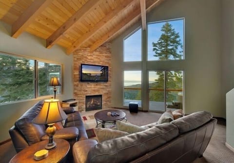 2nd Floor Den: Gas fireplace, rock hearth, mind-numbing views of Lake Tahoe.