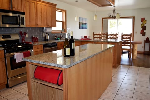 Kitchen with granite counter tops and stainless appliances
