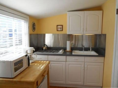 In your galley:  4 burner stove, refridgerator, microwave, toaster, coffee maker