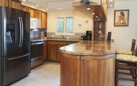 Remodeled wide kitchen, quality appliances and recessed lighting.