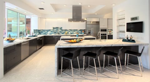 Marble counters, pass thru windows to outdoor kitchen, all the amenities!