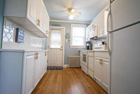 Rear door leads to large deck.