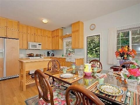 Delicious Kitchen and Dining Area With Garden Views