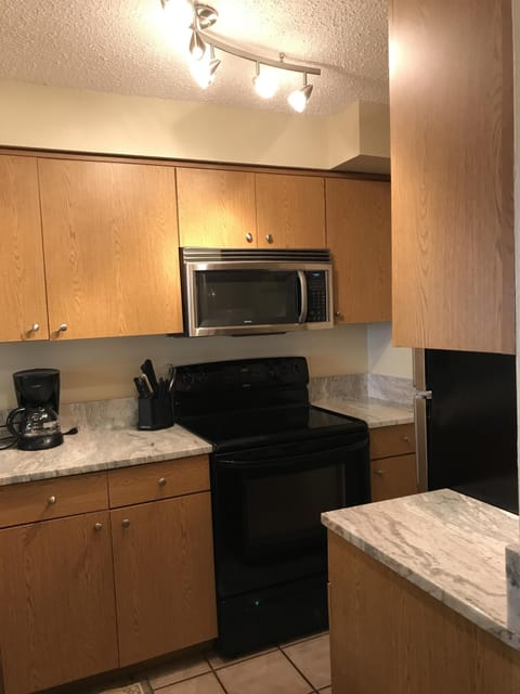 Fully stocked kitchen from entry