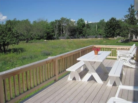 relax on the deck while taking in views of Cadillac Dorr Gorham & Champlain Mnts
