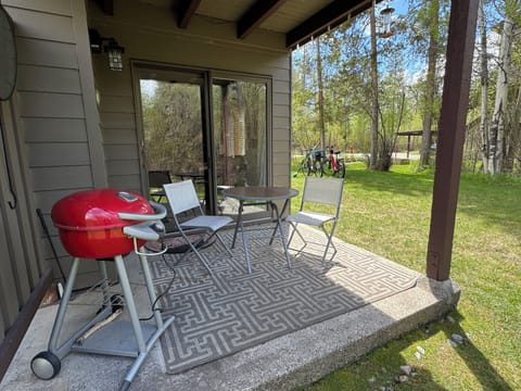 Grill and enjoy the sunny patio with adjacent large lawn