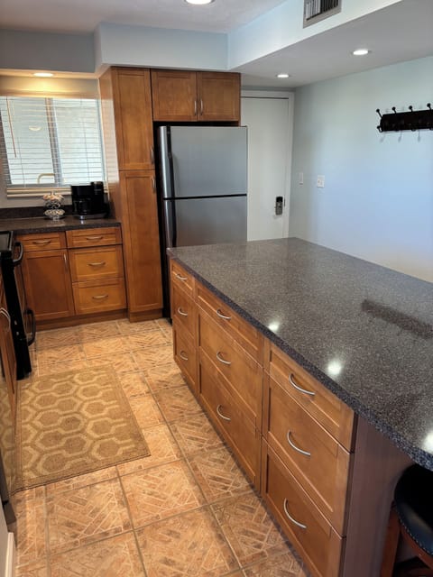 Plenty of cabinet space stocked with all of the essentials