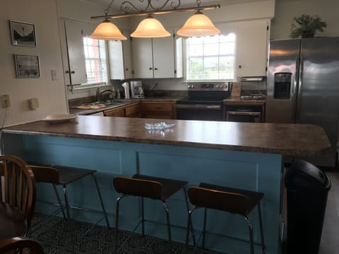 Kitchen bar for extra seating. 