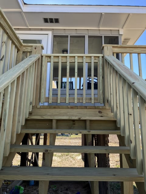 Toddler gates front and back staircase. 