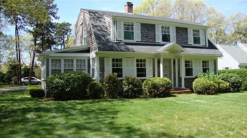 Front of home from Parker Road. Driveway to left.