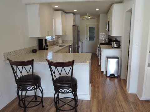 New Custom Kitchen With All New Appliances and Gas Stove/Oven With Bar Area for Additional Dining