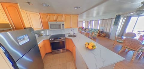 kitchen + dining room + living room