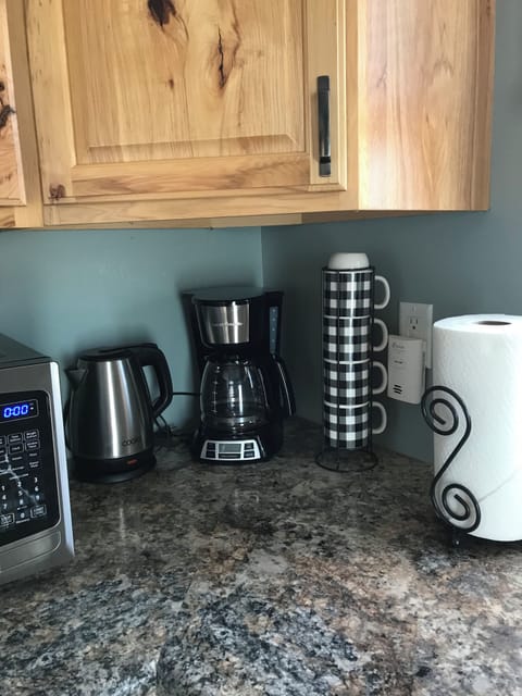 Drip coffee maker and hot water kettle. Filters are not needed but can be used.