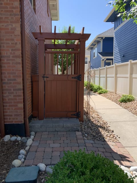 Side gate to enter to the carriage house.  