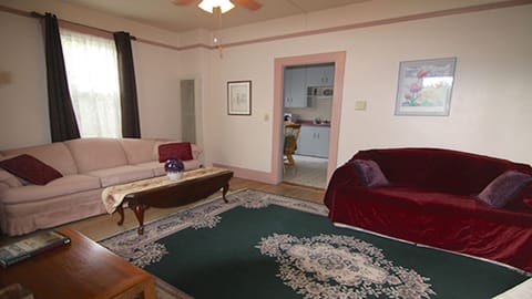 Living Room with TV and Roku player for your use.